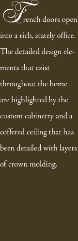 French doors open into a rich, stately office.  The detailed de
