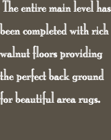  The entire main level has been completed with rich walnut floo