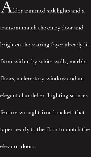 Alder trimmed sidelights and a transom match the entry door and